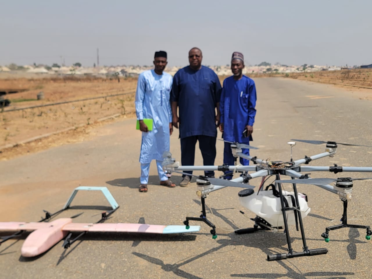 Aeris Motus field team with fixed-wing and multi-rotor platforms ahead of a sortie